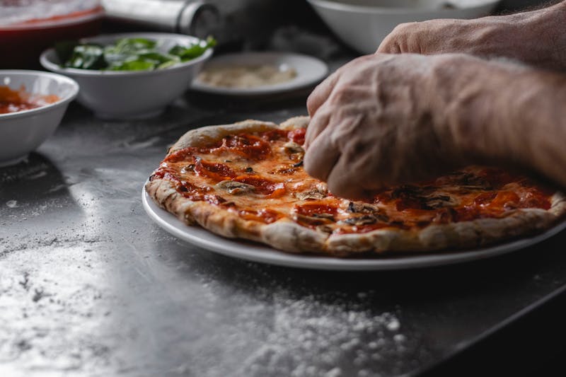 Giordanos team members serving customers in Denver restaurant